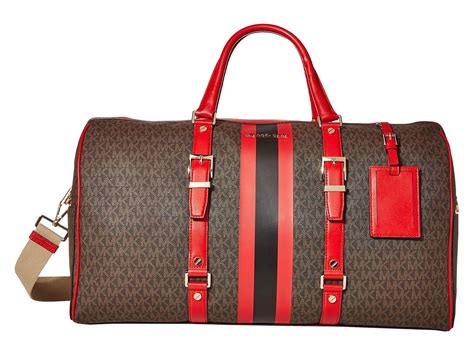 michael kors brown duffel bag|Michael Kors travel suitcase.